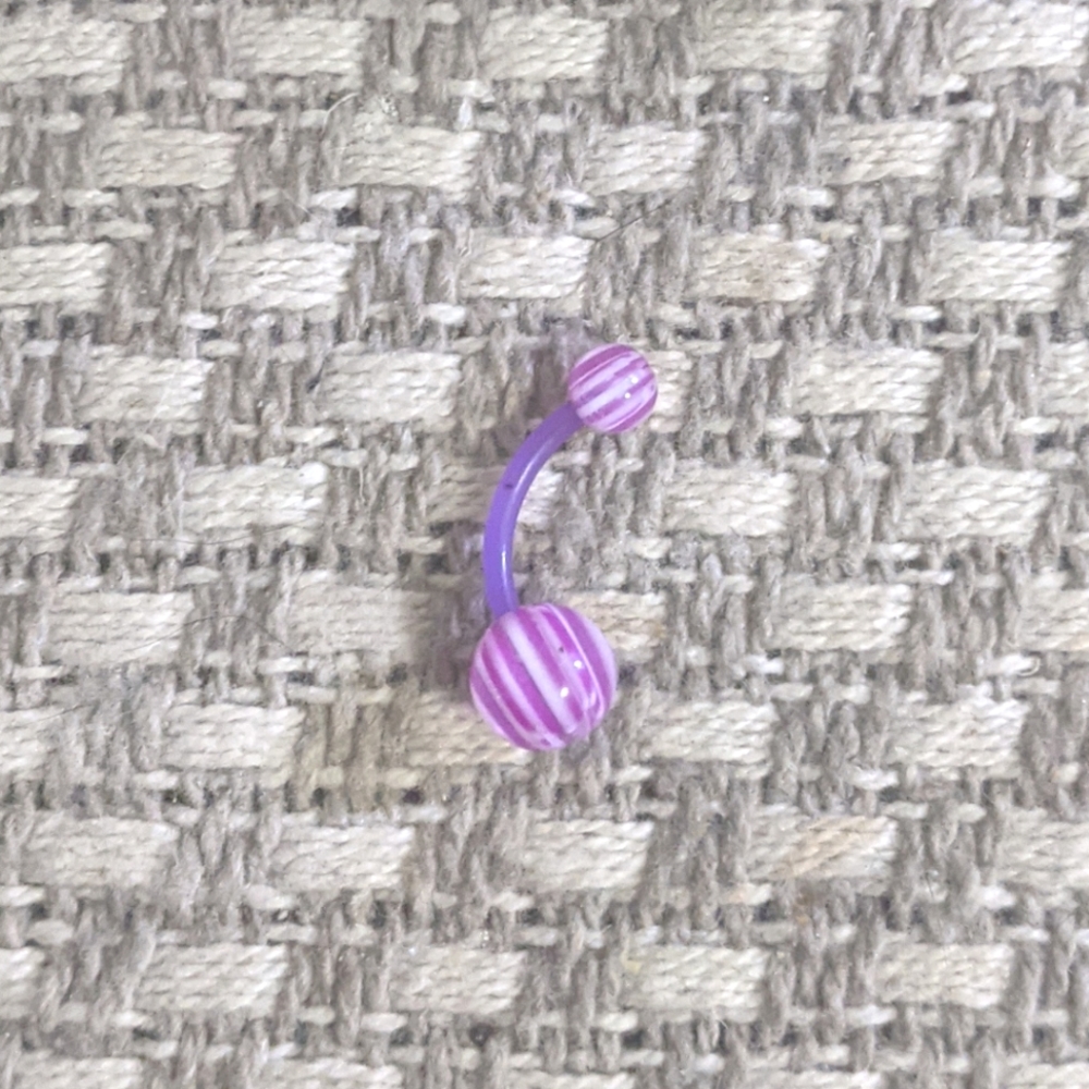 Purple plastic belly ring